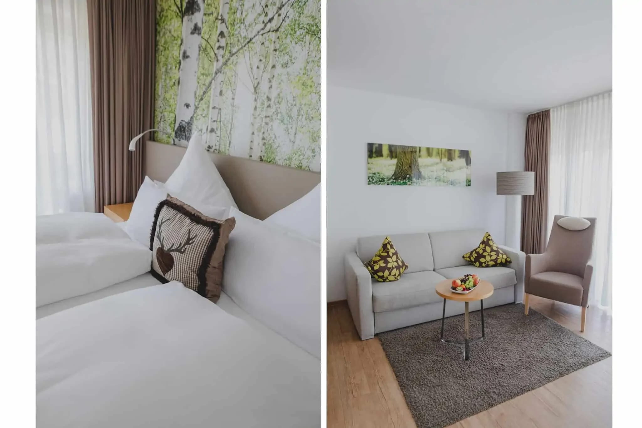 Zimmer mit Doppelbett vor Birkenmotiv und gemütlicher Sofaecke