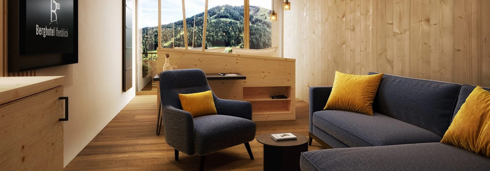 Helle Suite mit Wohnbereich und großem Panoramafenster mit Bergblick